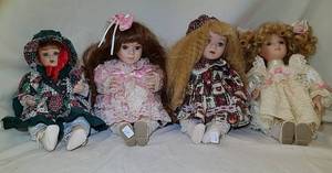 lot 442 image: 4 Porcelain Doll Music Boxes
