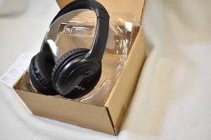 lot 12 image: PTI Black Headphones w cable