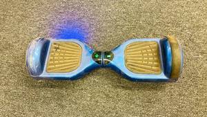 lot 70 image: Blue Hover Board (Powers on, includes power adapter)