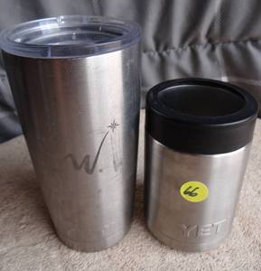 lot 66 image: PAIR OF YETI TUMBLERS (1 WINSTAR ADVO)