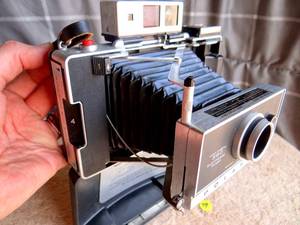 lot 79 image: Vintage Polaroid Automatic 360 Land Camera W Zeiss Ikon Rangefinder