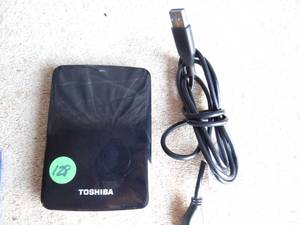 lot 128 image: Toshiba V73600-c 1tb Portable Hard Drive & USB 3.0 Cord
