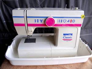lot 168 image: White Classic Zig Zag Sewing Machine 312 w Foot Pedal & Carrying Case