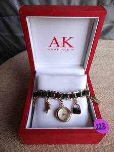 lot 223 image: BEAUTIFUL ANNE KLEIN CHARM BRACELET IN CUSTOM BOX