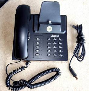 lot 229 image: ZIGEE BLUETOOTH DESK PHONE DOCKING STATION FOR SMARTPHONE - CHECK COMPS $$$