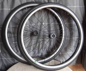 lot 235 image: Wheelchair Tires -  Orion Primo 24 x 13 size Wheels - Lightweight