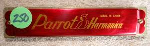 lot 250 image: PARROT HARMONICA Vintage 32 hole
