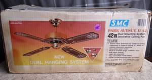 lot 295 image: VINTAGE  SMC PARK AVENUE VINTAGE CEILING FAN POLISHED BRASS W STENCIL BLADES 42 UNUSEDNIB