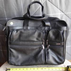 lot 305 image: TUME 4 WHEEL LAPTOP BRIEF CASE - ALL LEATHER - $$$$