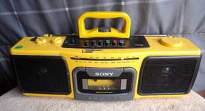 lot 327 image: Vintage Sony Sports Yellow CFS-920 AMFM Stereo Cassette