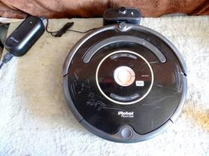 lot 340 image: iROBOT ROOMBA WITH CHARGING BASE - TESTEDTALKINGCHARGING - MISSING PARTS - SEE PIC 4