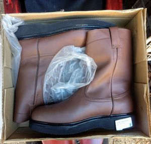lot 7 image: A pair of boots, color brown, Size US 11.5 Mens, MX 30 cm