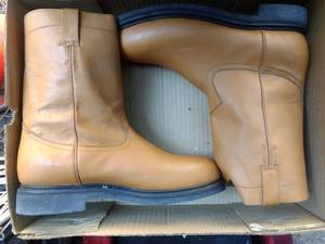 lot 8 image: Two (2 X Money) pairs of boots, the colors are black and honey , Size US 11.5 Mens, MX 30 cm black pair are Oil and acid Resistent