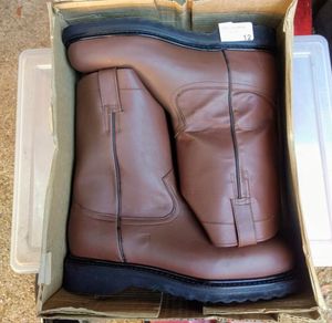 lot 12 image: A pair of boots, color brown, Size US 11.5 Mens, MX 30 cm