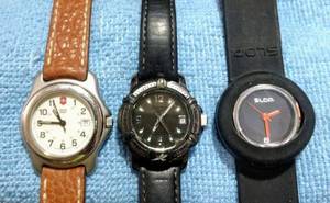 lot 126 image: Three womens watches, a Swiss Army, a slap and a Reebok, all need batteries. (One Money)