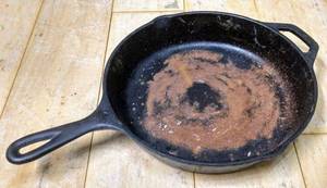 lot 227 image: Vintage Lodge #4 8sk Cast Iron Skillet Frying Pan 10 Inch Double Pour USA, needs to be reseasoned.