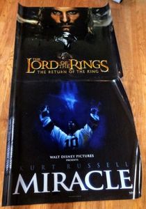 lot 230 image: 2 movie posters printed on plastic film, 45.5 L x 40.5 Tall, The Miracle and The Lord of the Rings (2 x Money)