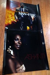lot 236 image: 2 movie posters printed on plastic film, 45.5 L x 40.5 Tall, Man on Fire and Ashanti, (2 x Money)