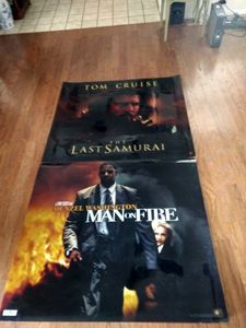 lot 237 image: 2 movie posters printed on plastic film, 45.5 L x 40.5 Tall, Man on Fire and The Last Samuri(One Money)