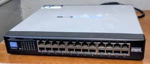 lot 243 image: LINKSYS SR224 24-Port 10100 Ethernet Switch Powers On
