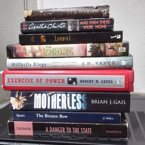 lot 253 image: 9 books The Hobbit, Agatha Christie and then there were none, El Hobbit in Spanish,  The Stoneholding, Hillbilly Elegy, Exercise of Power by Robert Gates, Motherless, The Bronze Bow,  A Danger to the State, (All One Money)