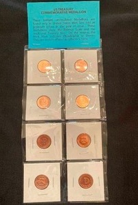 lot 34 image: US Treasury Commemorative Medallion Set2009 Lincoln Penny Set1909 Lincoln Head Cent