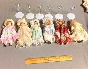lot 71 image: group of 6 ceramic dolls with stands