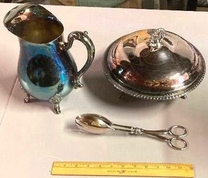 lot 90 image: Silver-plate pitcher, covered dish and serving tongs