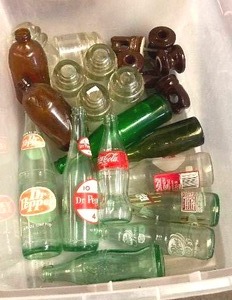 lot 103 image: Collection of Bottles and glass insulators