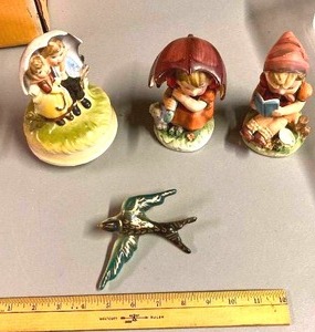 lot 114 image: Hummel like Figurines, a music box, and ceramic sparrow