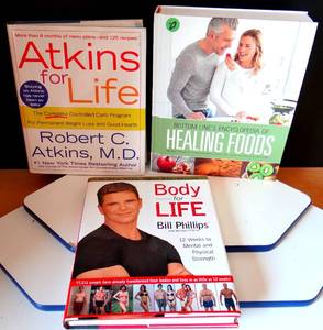 lot 27 image: NICE LOT OF 3 HARDBACK FITNESS BOOKS