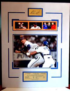 lot 89 image: NOLAN RYAN LEGENDARY MOMENTS MATTED PHOTO DISPLAY WITH METAL FACSIMILE SIGNATURE & BIO PLATE - MEASURES 16 X 20