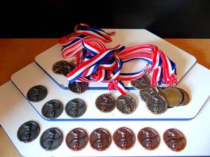 lot 112 image: GOLD, SILVER, BRONZE (TONED) ENGRAVEABLE MEDALS WITH RIBBONS - GREAT FOR AWARD PRESENTATIONS