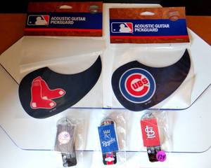 lot 124 image: MLB COLLECTION OF TEAM GUITAR PICK GUARDS & KEY CHAINS