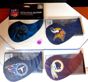 lot 127 image: COLLECTION OF NFL LICENSED GUITAR PICK GUARDS - PANTHERS, VIKINGS, TITANS, & REDSKINS(THIS LOGO IS NO LONGER USED)