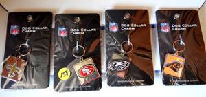 lot 158 image: ASSORTMENT OF NFL DOG COLLAR CHARMS - SAINTS, 49ERS, EAGLES, & PANTHERS