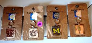 lot 166 image: NCAA OFFICIAL LICENSED DOG COLLAR CHARMS - TEXAS A&M, AUBURN, MICHIGAN, & ARIZONA STATE