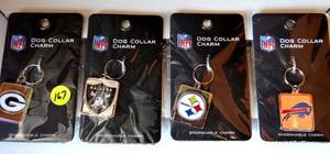 lot 167 image: ASSORTMENT OF NFL DOG COLLAR CHARMS - PACKERS,RAIDERS, STEELERS, & BILLS