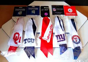 lot 175 image: ASSORTMENT OF LICENSED PONYTAIL HOLDERS - NCAA OKLAHOMA & TCU, NHL RED WINGS, NFL GIANTS, & MLB TEXAS RANGERS