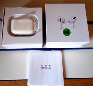 lot 246 image: NOTE DESCRIPTION CHANGE - AirPods Pro With Wireless Charging Case White