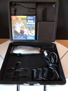 lot 275 image: OSTER HOME GROOMING CLIPPER WITH GUARDS - MODEL 78950-101