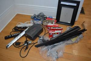 lot 53 image: Misc. Lot Power Surge Protectors, Light Bulbs, Picture Frames NO SHIPPING