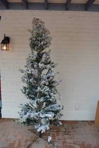 lot 31 image: Flocked Narrow Christmas Tree