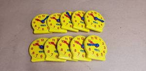 lot 12 image: Lot of 10 ETA Cuisenaire 4 Geared Student Clocks