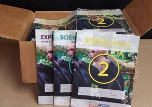 lot 131 image: 11 NEW Sets of STEMscopes Texas 2nd Grade Workbooks - 33 Total Books
