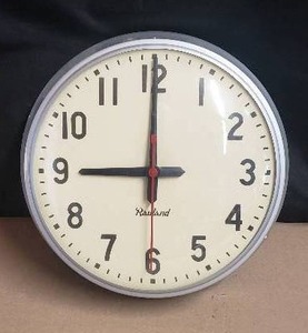 lot 65 image: Vintage Rauland Wall Clock - 12 Face with Metal Frame and Glass Front