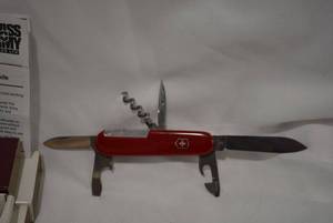 lot 275 image: Swiss Army Knife and Knife marked Puva 255 Stainless Germany