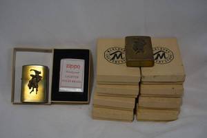 lot 287 image: Marlboro Solid Brass Country Zippo Lighters, 10 Total