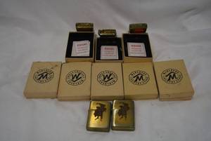 lot 288 image: Marlboro Solid Brass Country Zippo Lighters, 10 Total