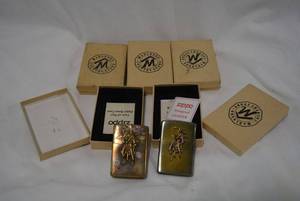 lot 289 image: Marlboro Solid Brass Country Zippo Lighters, 5 Total
